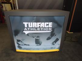 Custom Gravitee Modular Inline Exhibit with SEG Fabric Graphics, (3) Monitor Mounts, Closet Storage, (2) MOD-1509 Backlit Counter with Locking Storage, and (1) Custom Backlit Counter with Wireless Charging Pads -- View 4