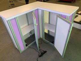 RENTAL: (2) RE-1043 Single-Sided Lightboxes Attached in L-Shape Configuration, RE-1572 L-Shaped Backlit Reception Counter, SEG Backlit Fabric Graphics -- View 3