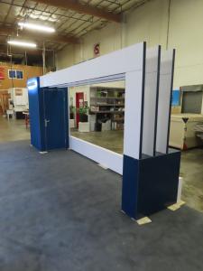 Custom Inline with Gravitee Closet, SEG Graphics, Archway Support for LED Video Tiles, Locking Cabinet, and (2) Custom L-shaped Counters with Halo Lit Logo Signs -- View 2