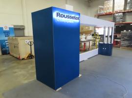 Custom Inline with Gravitee Closet, SEG Graphics, Archway Support for LED Video Tiles, Locking Cabinet, and (2) Custom L-shaped Counters with Halo Lit Logo Signs -- View 3